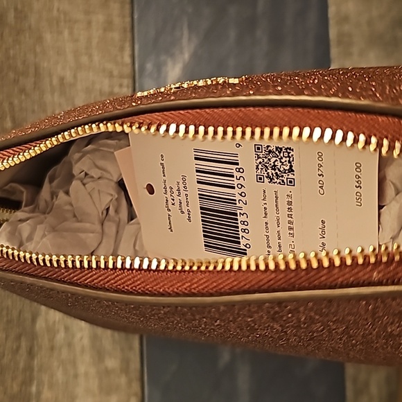 Kate Spade New York Shimmy Tinsel Glitter Cosmetic Case in maroon (deep nova). - Picture 5 of 5